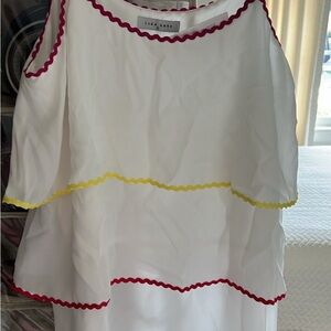 Multi tierd top NWT size S with Red and Yellow Accents